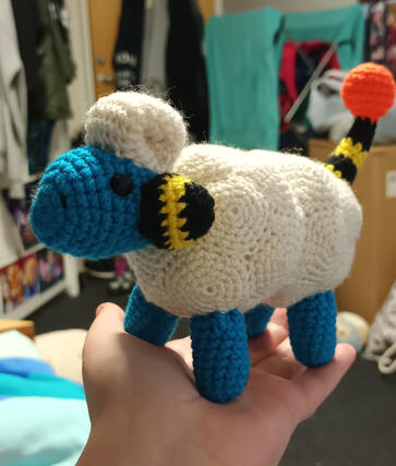 A crocheted plushie of the pokemon Mareep